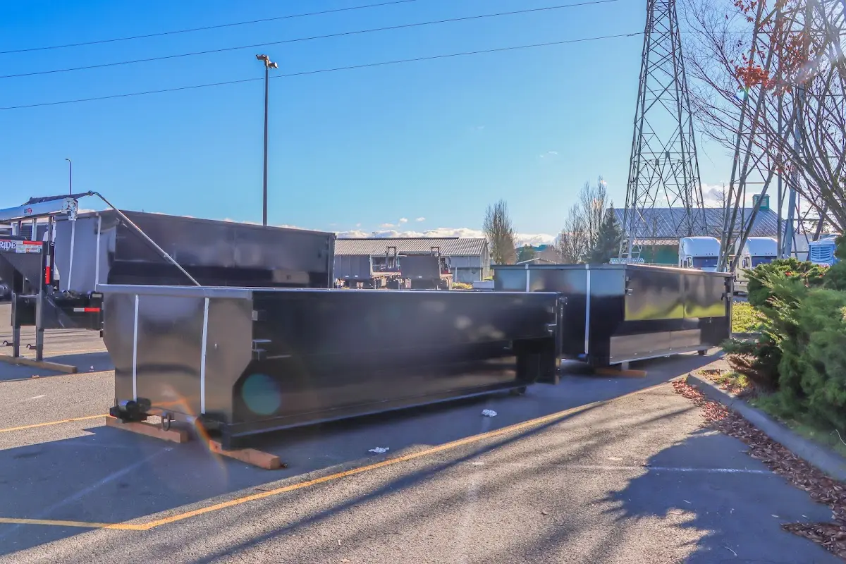 Roll-off dumpster ready for waste disposal at job site for 2 Yard Dumpster Rental in West Frankfort